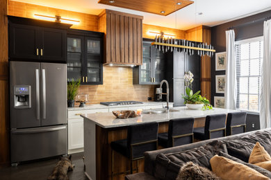 Large minimalist single-wall dark wood floor, brown floor and wood ceiling eat-in kitchen photo in Atlanta with an undermount sink, shaker cabinets, black cabinets, quartz countertops, brown backsplash, ceramic backsplash, stainless steel appliances, an island and white countertops