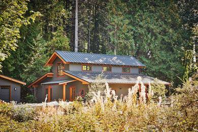 Mountain style gray two-story exterior home photo in Seattle