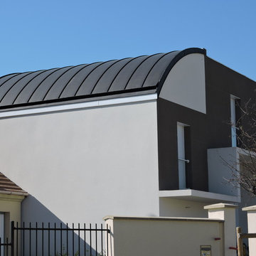 MAISONS A TOIT CINTRE