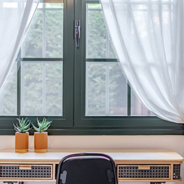 Dormitorio invitados con pequeña zona de estudio