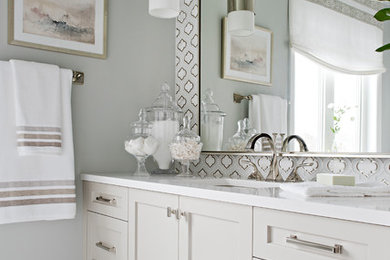 Inspiration for a mid-sized transitional master multicolored tile and mosaic tile porcelain tile and white floor bathroom remodel in Toronto with shaker cabinets, gray cabinets, gray walls, a drop-in sink, quartz countertops and white countertops