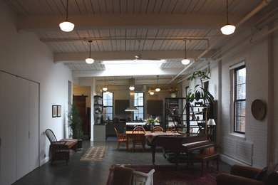 Inspiration for a large modern formal and loft-style dark wood floor and brown floor living room remodel in New York with white walls, no fireplace and no tv