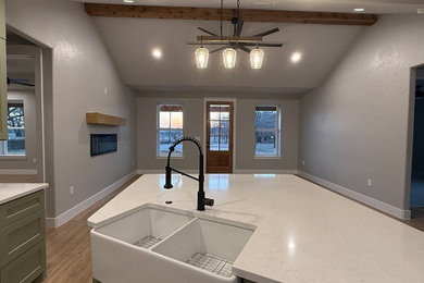 Farmhouse home design photo in Dallas