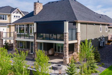 Example of a minimalist exterior home design in Calgary