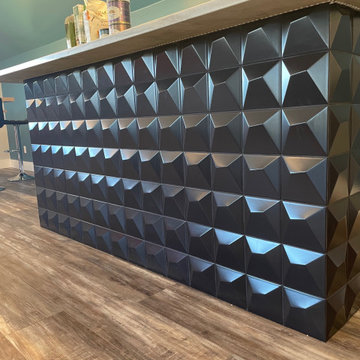 Exclusive Bar Front done with modern three-dimensional black tiles.