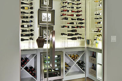 Inspiration for a transitional wine cellar in Other.