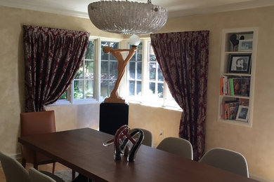 Mid-sized elegant light wood floor enclosed dining room photo in San Francisco with beige walls and no fireplace
