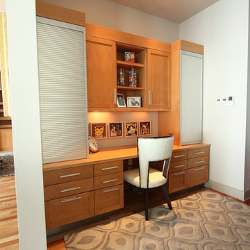 Office off Kitchen with Light Stained Maple Cabinets and Aluminum Tambour Doors