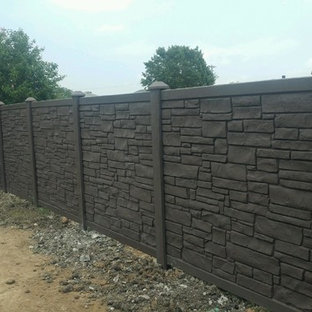 Expansive modern backyard full sun formal garden in Austin with a garden path and gravel for spring.