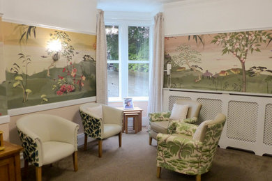 Design ideas for a medium sized world-inspired formal open plan living room feature wall in Other with multi-coloured walls, beige floors and wallpapered walls.