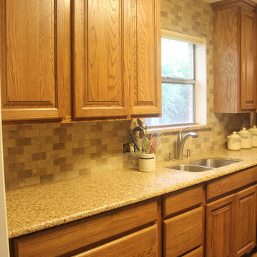 Tawny Oak Cabinets w/Chocolate Truffle Caesarstone and Subway Backsplash