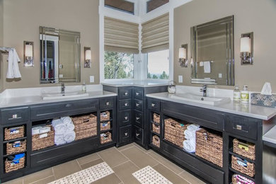 Inspiration for a contemporary gray tile and ceramic tile ceramic tile bathroom remodel in Other with open cabinets, black cabinets, gray walls, a drop-in sink and solid surface countertops