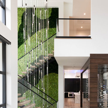 Electic Switchback Staircase with Glass Railing