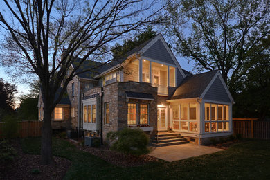 Photo of a mid-sized transitional three-storey exterior in DC Metro with mixed siding.