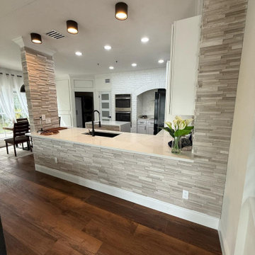 **Complete Kitchen, Flooring, Complete Stair Case and Trim