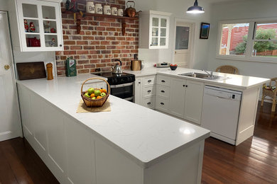 This is an example of a traditional kitchen in Other.