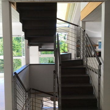 Escalier en bois balustrades en acier