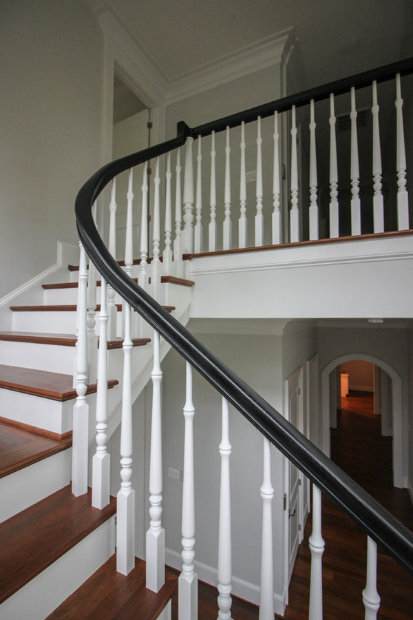 Powerful Impression by Floating Staircase in Suburban Foyer