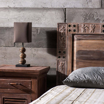 Contemporary bedroom with cement wall panelling