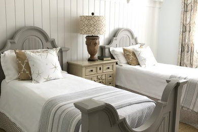 Beach style carpeted bedroom photo in Atlanta with white walls