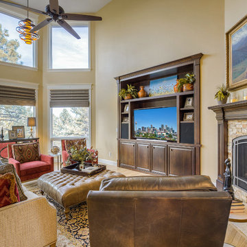 Reworked custom cabinetry in a darker stained finish highlight this living room.