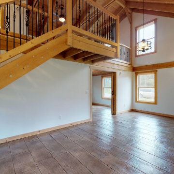 Open Concept Living Room with Loft Above
