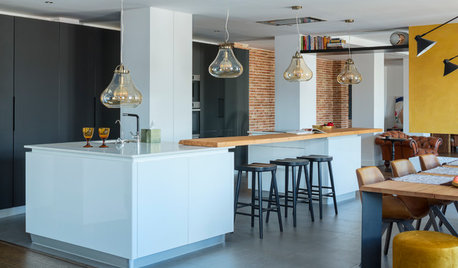 Más vale una imagen... : 21 cocinas modernas con barra de madera