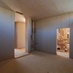 Holzhaus mit Strohbauplatten im Innenausbau - Wandpaneele