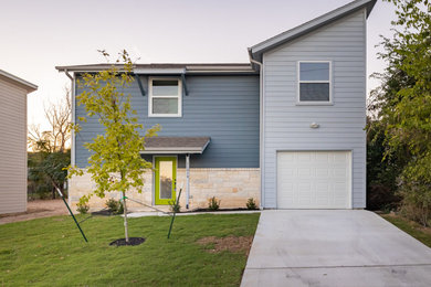 Transitional exterior home photo in Austin