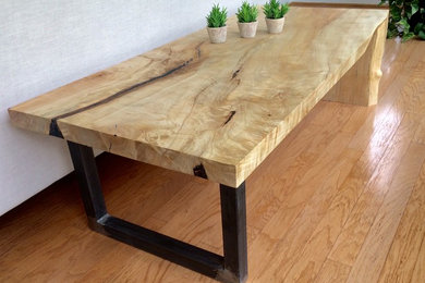 Inspiration for a mid-sized coastal medium tone wood floor dining room remodel in Other with white walls