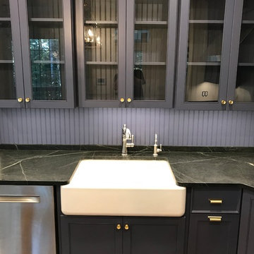 Farmhouse sink and glass fronted cabinets
