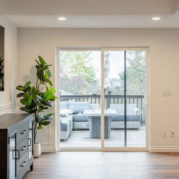 Modern Great Room with Vaulted Ceilings and Custom Wall Molding