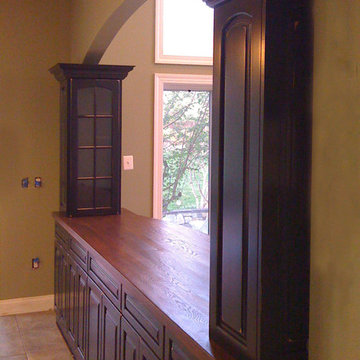 Kitchen with Innovative Pass-Through Storage Divider Between Kitchen & Family Rm