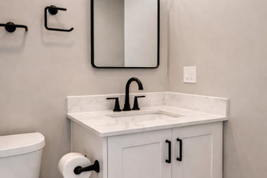 Inspiration for a modern powder room remodel in Boston