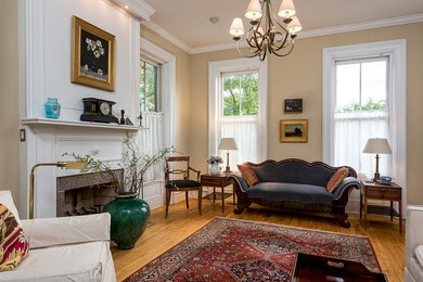 Example of a mid-sized minimalist open concept light wood floor living room design in New York with a standard fireplace and a stone fireplace