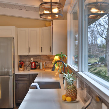Kitchen remodel in Frederick, MD with white granite countertop and stainless st
