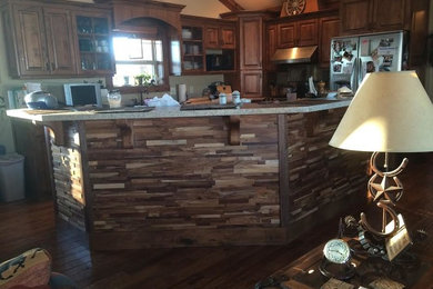 Example of a classic kitchen design in Other
