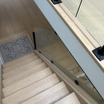 Glass Railings - custom-cut trapezium-shaped glass railing