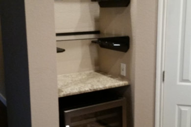 Eat-in kitchen - large modern l-shaped ceramic tile eat-in kitchen idea in Austin with a double-bowl sink, dark wood cabinets, granite countertops, brown backsplash, ceramic backsplash, stainless steel appliances and an island