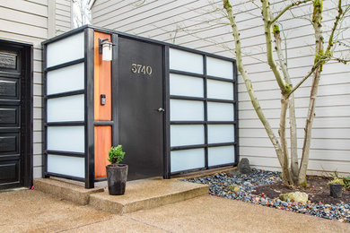 Example of a minimalist exterior home design in Portland