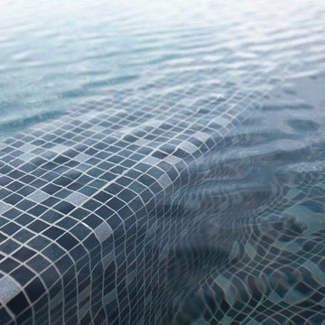 Modern pool with custom recycled glass mosaic mix