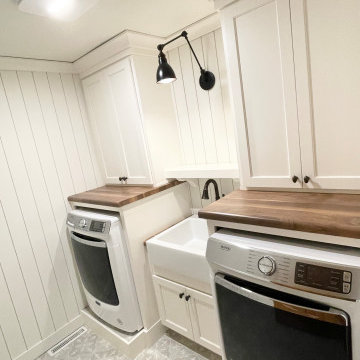 Laundry Room With Front Load Maytag, farmhouse sink, and AntiMicrobial Fan/Light