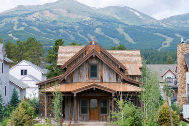 Rustic exterior home idea in Denver