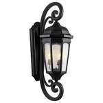 Kichler - Outdoor Wall 3-Light, Textured Black - Uncluttered and traditional, this 3 light outdoor wall lantern from the Courtyard collection adds the warmth of a secluded terrace to any patio or porch. Featuring a Textured Black finish and clear seedy glass, this design will elevate and enhance any space.