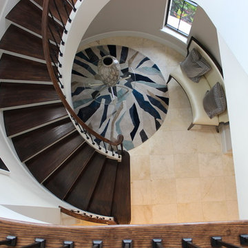 Curved Red Oak Stair with Single Basket & Twist Iron Balusters
