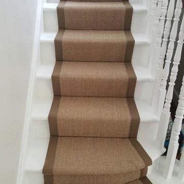 Brown Carpet with Brown Edgings Installed to Stairs