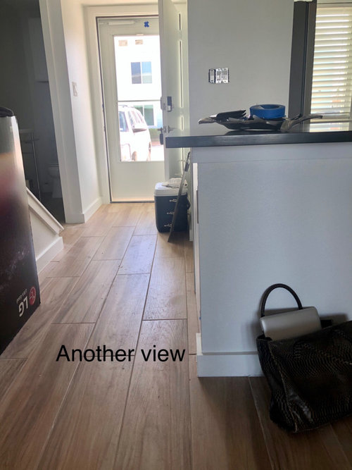 Quartz countertop installed with one long overhang