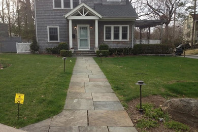 Traditional stone exterior home idea in New York