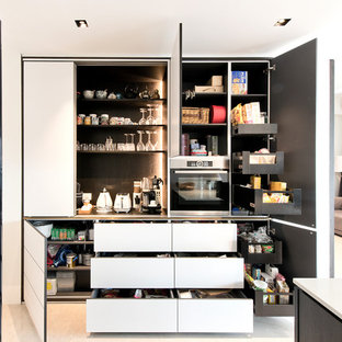 Contemporary kitchen pantry pictures - Kitchen pantry - contemporary beige floor kitchen pantry idea in Singapore with flat-panel cabinets and white cabinets