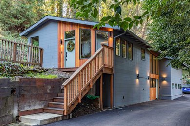Example of a beach style home design design in Other